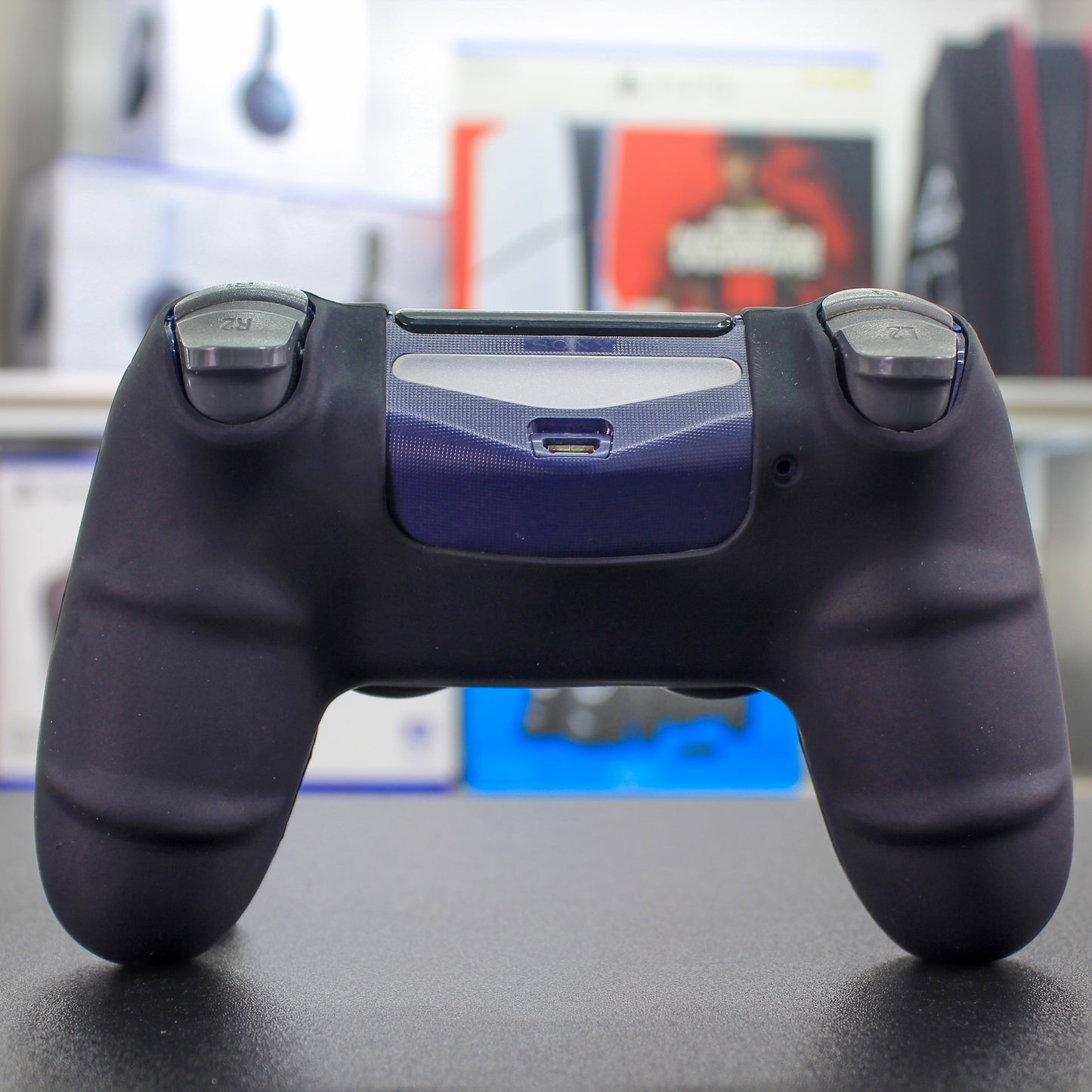 Cover de silicón negro con azul para mando de PS4