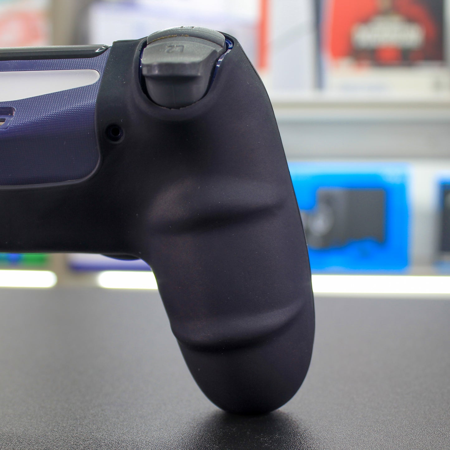 Cover de silicón negro con azul para mando de PS4