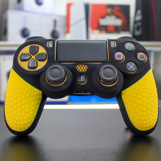 Cover de silicón negro con amarillo para mando de PS4