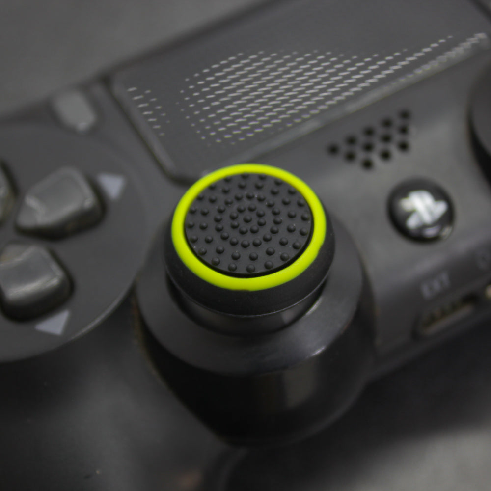 Protector de joystick negro con amarillo