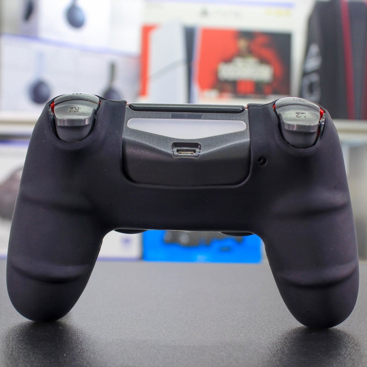 Cover de silicón negro con rojo para mando de PS4